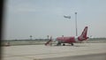 thai air asia airbus a320 doing ground service parking prepare for next flight