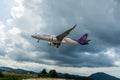 Thai Airways airbus A320 is landing at Phuket Airport, photograph from checkpoint of Thailand Royalty Free Stock Photo