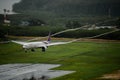 Thai airways airplane , Boeing 777-300, landing at phuket airp Royalty Free Stock Photo