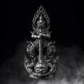 Thai Amulet, Thao Wes Suwan Bronze Statue. Royalty Free Stock Photo