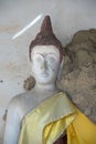 Thai ancient sitting white Buddha on a Thai Buddhist temple.