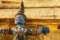 Thai antique sculpture, giant sculpture from Ramayana epic poem at Wat Phra Keaw, temple of the emerald Buddha, Bangkok Royalty Free Stock Photo