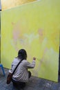 Thai art students paint portraits