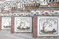 Thai art wall around Wat Arun Rajwararam.