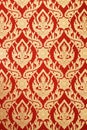 Thai Art wall red pattern deity design. Royalty Free Stock Photo