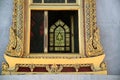 Thai art on window of Church at Wat Benchamabophit.