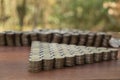 Thai Baht lots coin Arranged in triangle shape on with blurred background texture, Money stack for business planning investment an