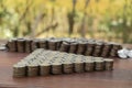 Thai Baht lots coin Arranged in triangle shape on with blurred background texture, Money stack for business planning investment an Royalty Free Stock Photo