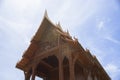 Thai beautiful wooden temple,thai style carving of temple in prachuapkhirikhan province Thailand,blue sky and cloud in backgroud