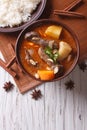 Thai beef massaman curry and rice side dish. vertical top view Royalty Free Stock Photo