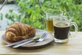 Thai Black Coffee and hot Tea with croissant bread on  Wooden Bar Royalty Free Stock Photo