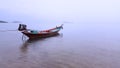 Thai boat in a foggy day.