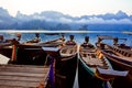 Thai boats at dawn. Boats at the pier. Royalty Free Stock Photo