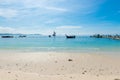 Thai boats in the sea near the pontoon in sunny weather Royalty Free Stock Photo