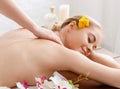 Thai body massage. Enjoying massage smiling girl