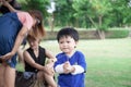 Thai boy with mom in the park Royalty Free Stock Photo