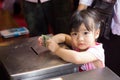 Thai Buddhist baby girl donates