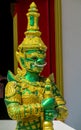 Thai Buddhist Temple Guardian Giant Suriyaphob green statue Royalty Free Stock Photo