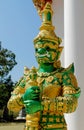 Thai Buddhist Temple Guardian Giant Suriyaphob green statue Royalty Free Stock Photo