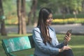 Asian business woman in office uniform Talking on the cell phone with the customer Royalty Free Stock Photo