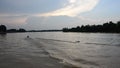 Thai children driving jet ski at Tapee river