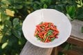 Thai chilli peppers in a white bowl