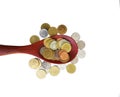 Thai coins in wooden spoon on white background Royalty Free Stock Photo