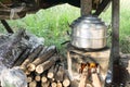 Thai cooking style, steam pot on vintage local fire-stove in kitchen of old wooden house, Thai stove, Thai food, cooking tool