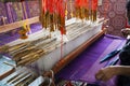 Thai craftsmanship technician professional use antique local wooden machine loom weaving hand woven cotton fabric for show