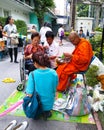 Thai culture , give alms to the monk at Rajvithi hospital