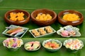 Thai dessert on banana leaf green background.