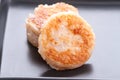 Thai dessert - coconut macaroon on black dish