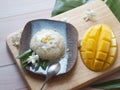 Thai dessert - isolated sticky rice with coconut milk and sweet mango