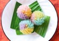 Thai dessert Kanom Chor Phaka stuff with soybean, colourful thai sweet in flower shape