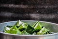 Thai Dessert in Steaming container - Stuffed Dough Pyramid, Thai desserts wrapped in banana Royalty Free Stock Photo