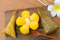 Thai dessert sticky rice wrapped in banana leaf and Toddy Palm Cake or Kanom Tarn Royalty Free Stock Photo
