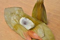 Thai dessert sticky rice wrapped in banana leaf Royalty Free Stock Photo