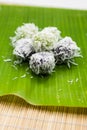 Thai dessert sweet boiled ball , roll over the grated coconut