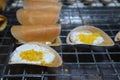 Thai desserts are made from batter, filled with white cream filling on top. Placed on a beautiful stainless steel wire