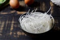 Thai died rice noodles in a bowl,Uncooked
