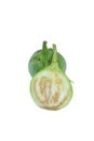 Thai eggplant, cut in half  Isolated with clipping path on a white background Royalty Free Stock Photo
