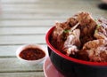 THAI ESAN style pork bones clear soup served hot in ceramic bowl