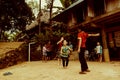 Thai ethnic children playing the traditional string-jumping game