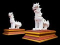 Imaginary twin white Singha sculpture In the northern Thailand temple made of cement, Isolated on black background. Royalty Free Stock Photo