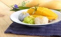 Thai famous delicious dessert - Closeup plate of sweet fresh ripe mango with three color of sticky rice , green from pandan and