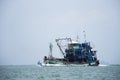 Thai fisher people sailing fishing boat ship in sea after catch fish and marine life in ocean of Phetra National Park to