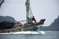 Thai fisher people sailing fishing boat ship in sea after catch fish and marine life in ocean of Phetra National Park to