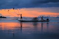 Thai fisherman in action ,Thailand Royalty Free Stock Photo