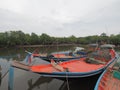 Thai fisherman boat in the river before out to the sea Royalty Free Stock Photo