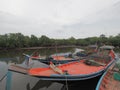 Thai fisherman boat in the river before out to the sea Royalty Free Stock Photo